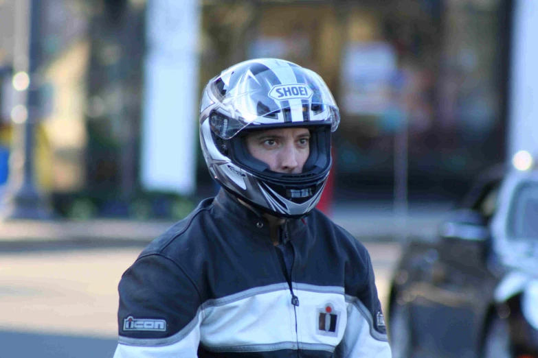 the man is wearing a helmet with the initials s8b