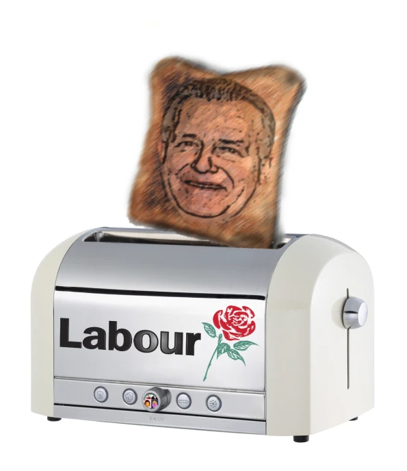 a toaster with an image of a man sticking out of it