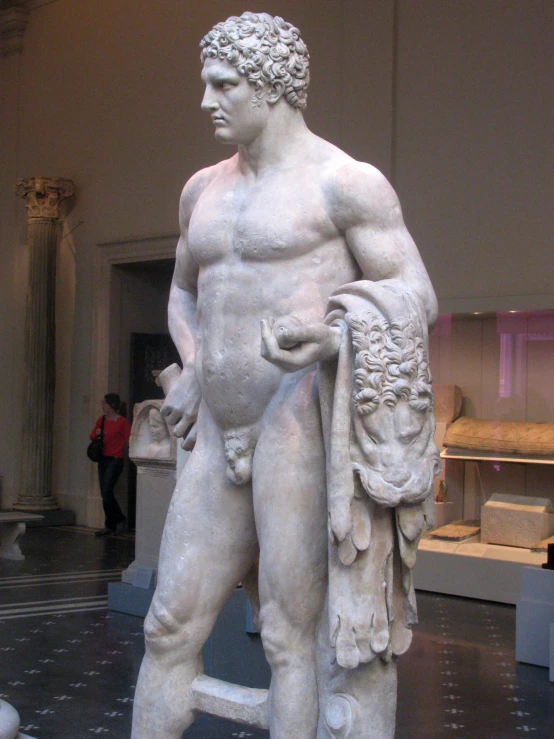 a statue of a man in a museum