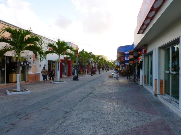 there is a small street with buildings along it