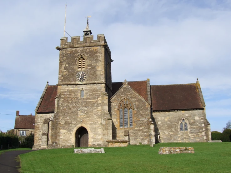 a large stone church building with two towers