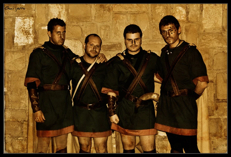 a group of men in roman costume