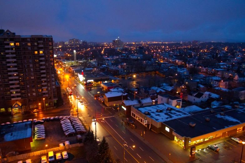 a view of the city at night from above