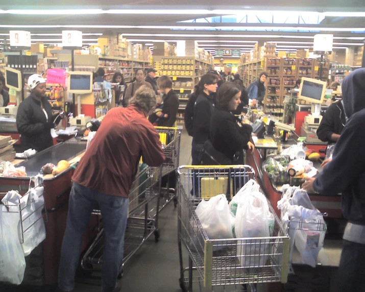 a large store with people shopping in it