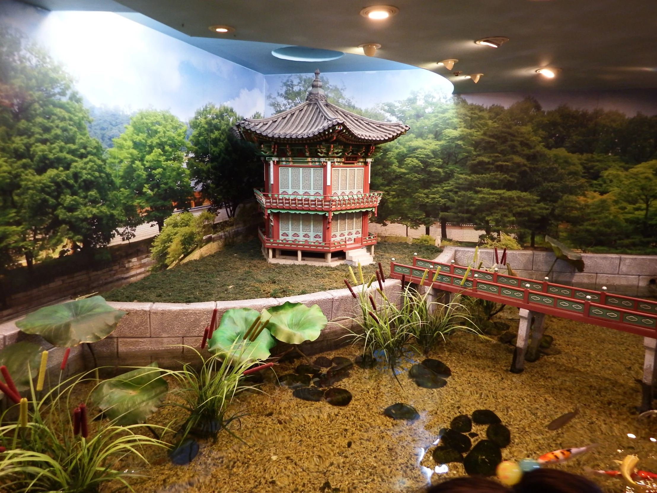 a large po is taken behind a fake pagoda