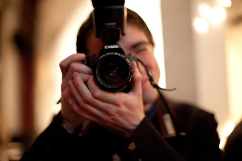 a man taking a picture with his camera phone