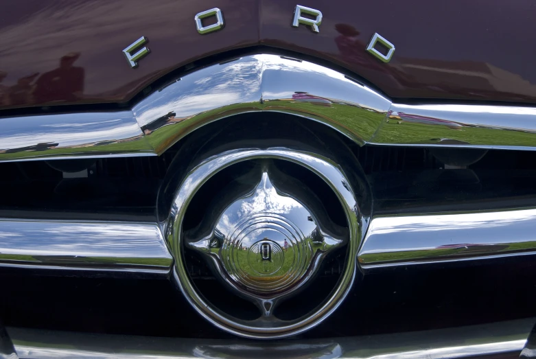 the hood emblem on the emblem on an old model car