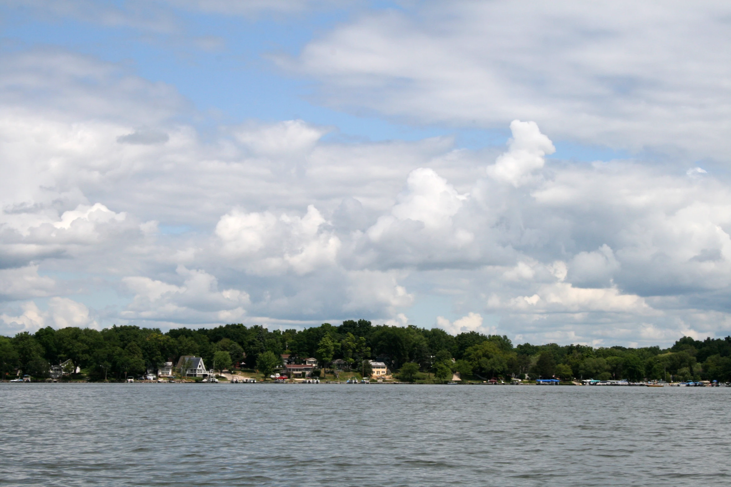 a large body of water with lots of boats in the water