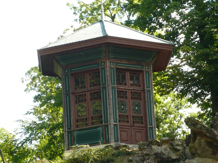 an elegantly designed red and green chinese tower