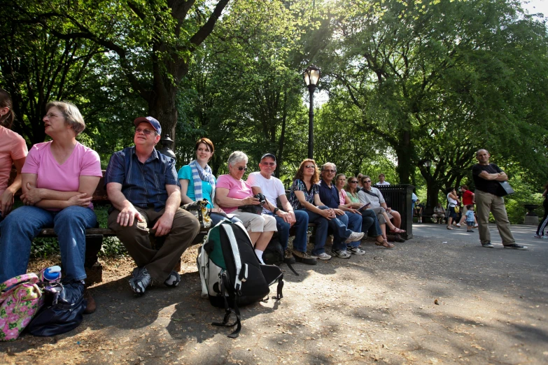 there is an image of people sitting on the bench