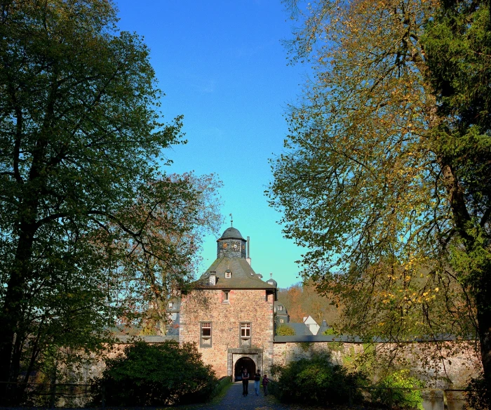 an old house in the middle of a park