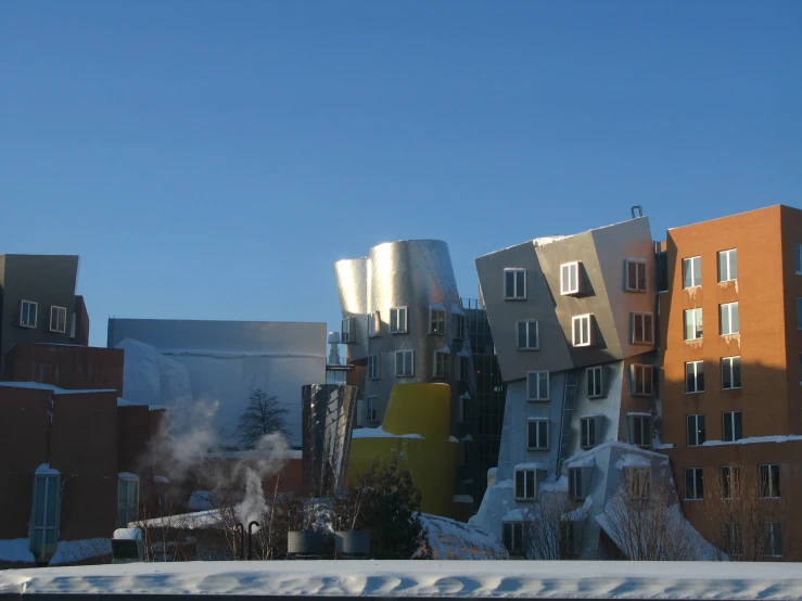 an unusual building with very large, metal towers