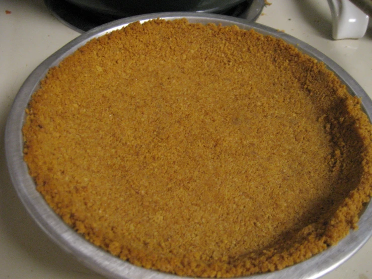 a cake with brown sugar on it on a counter
