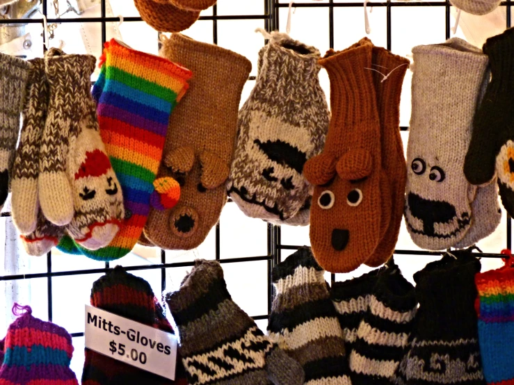 a rack with socks that have different colors and styles on them