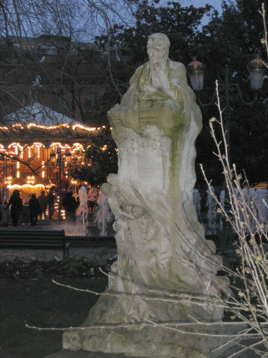 an image of the garden at night with lights