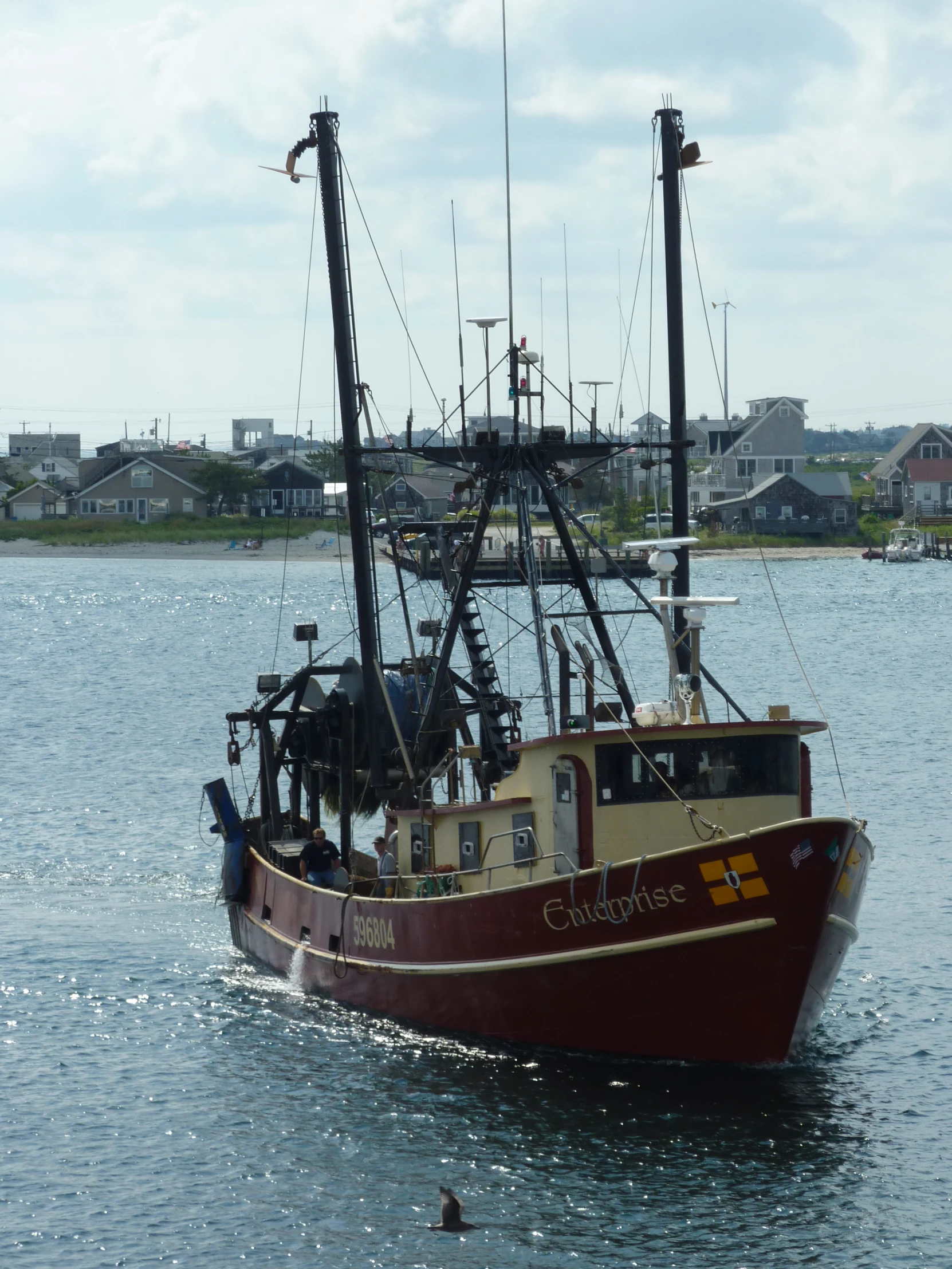 an image of a boat sailing in the water