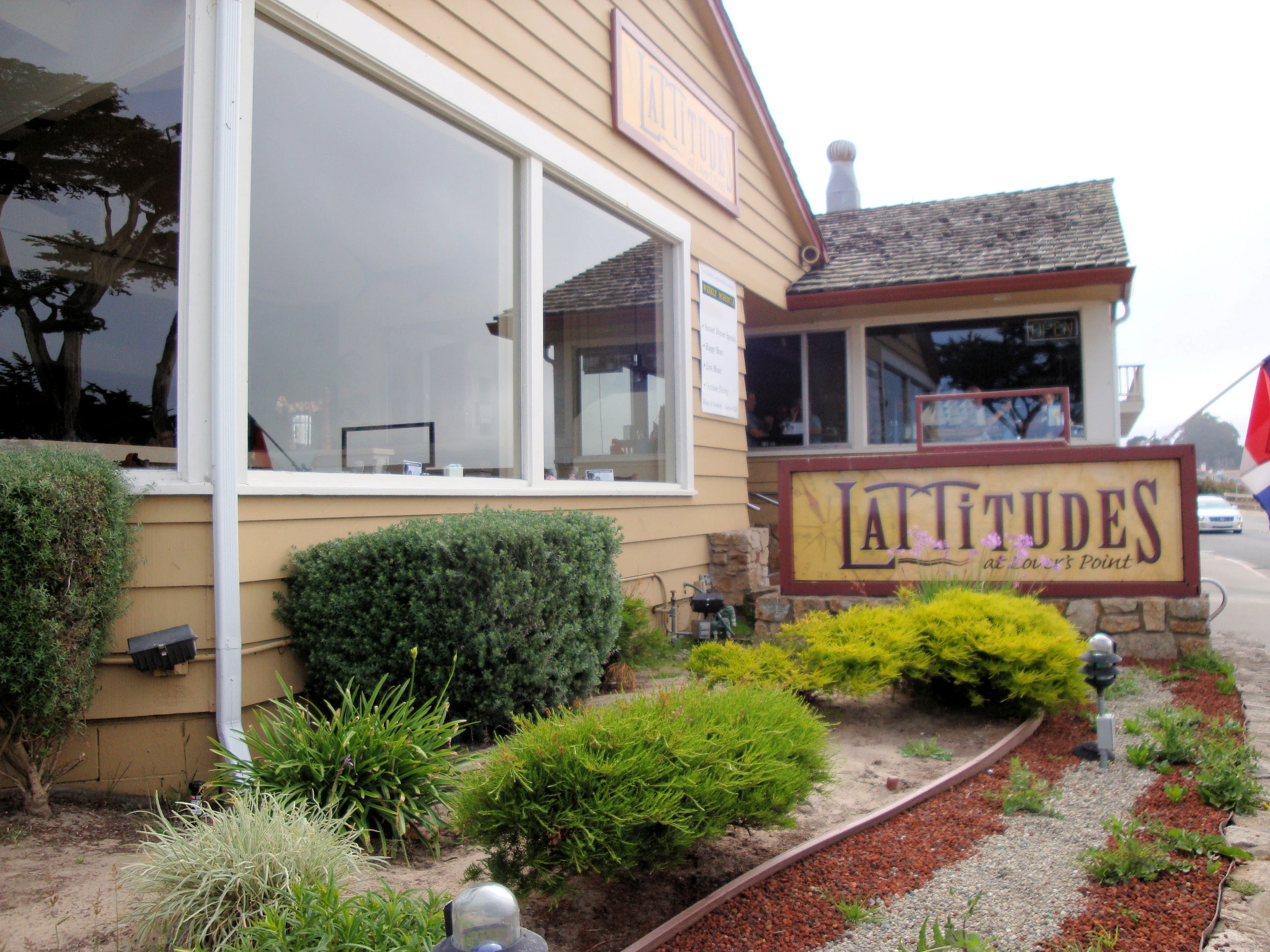 a shop front with a sign for tattoos and health spa