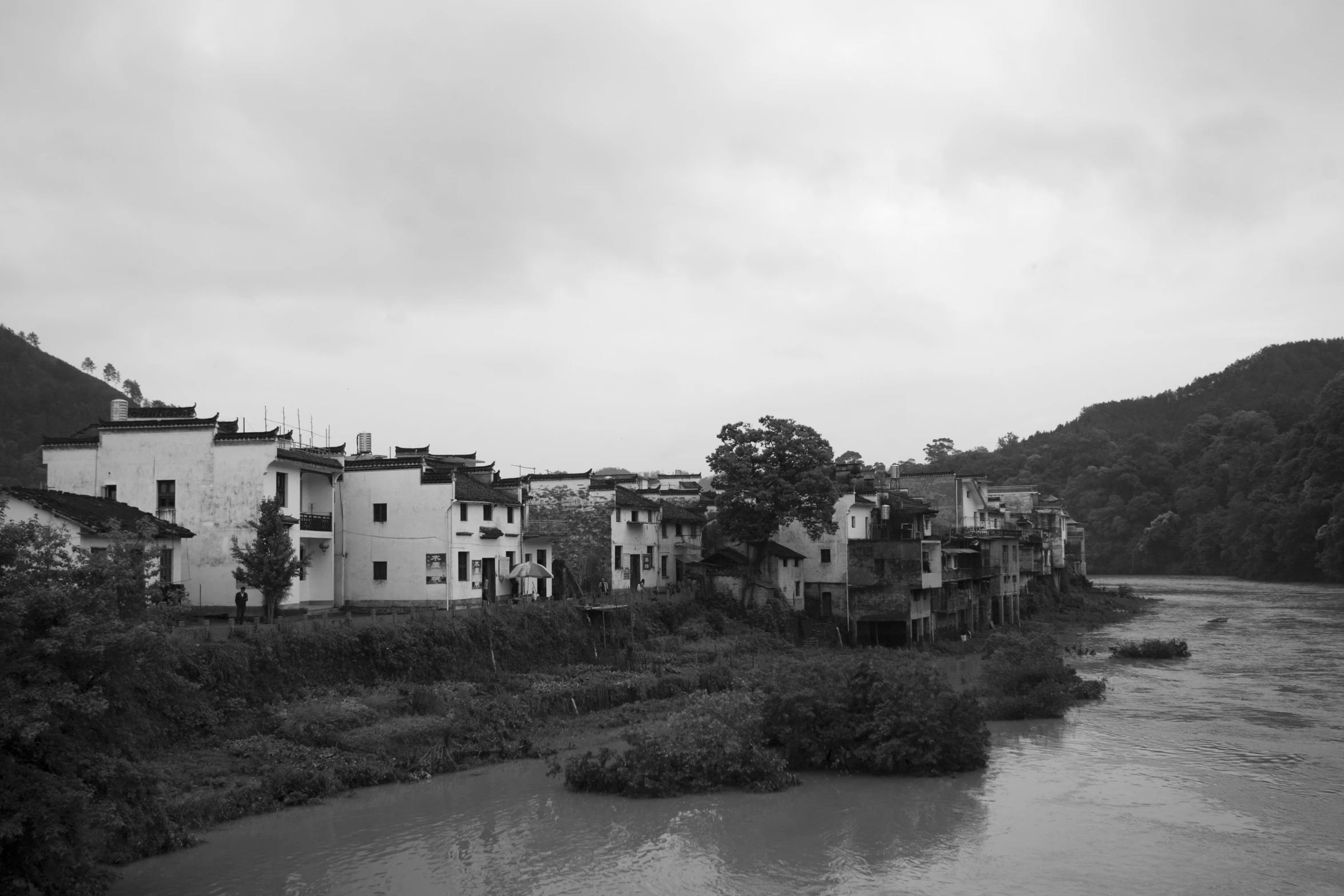 a view of a river in the middle of a city