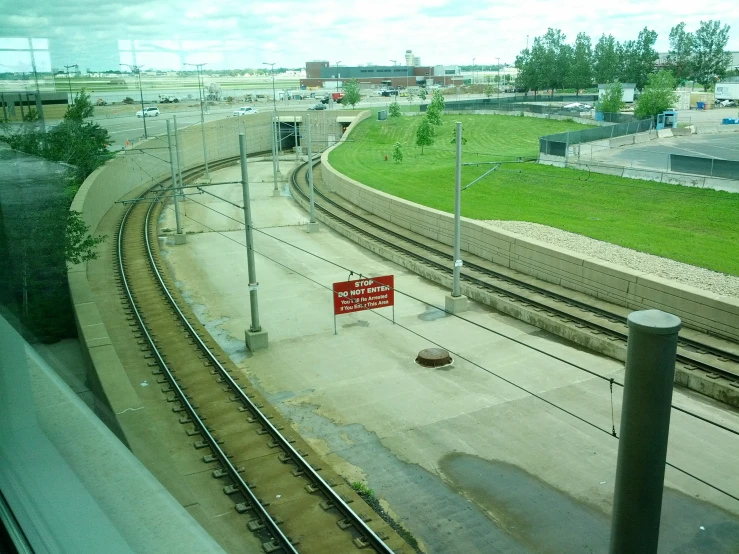 a railroad track going around a bend