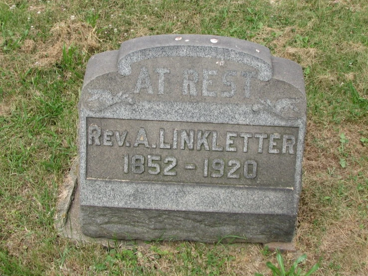 a grave stone of an unknown member of the same country