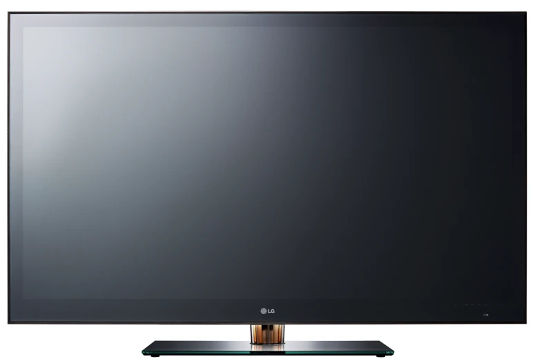 a flat screen television sitting in front of a white wall