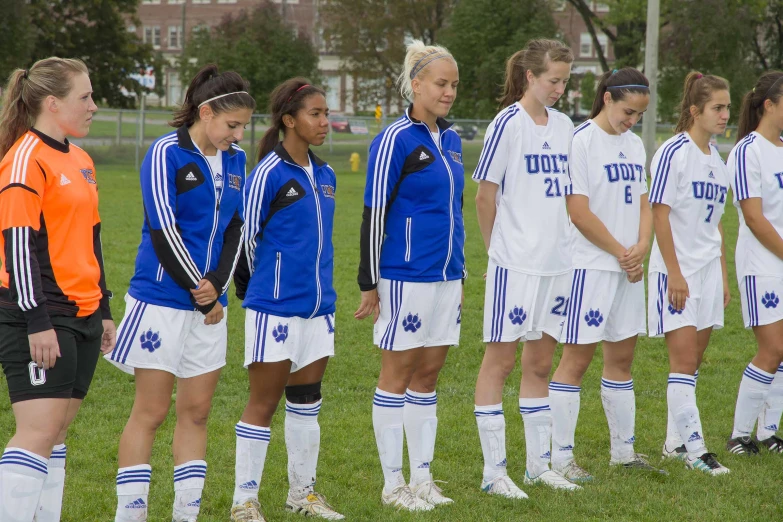 an image of female soccer team getting ready for match