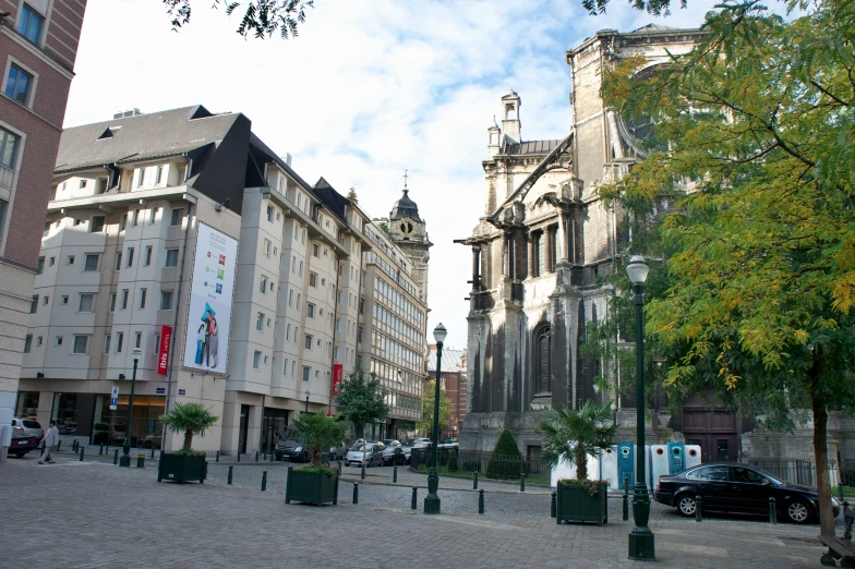 a group of buildings are shown on the street