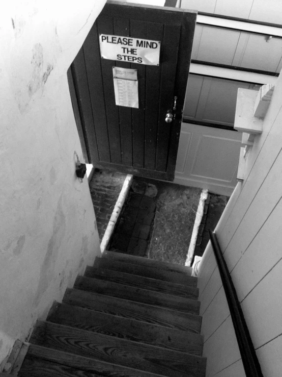 a black and white po of steps leading to the top