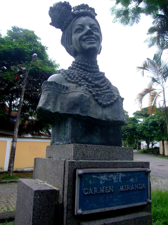 a statue of a woman on display in the city