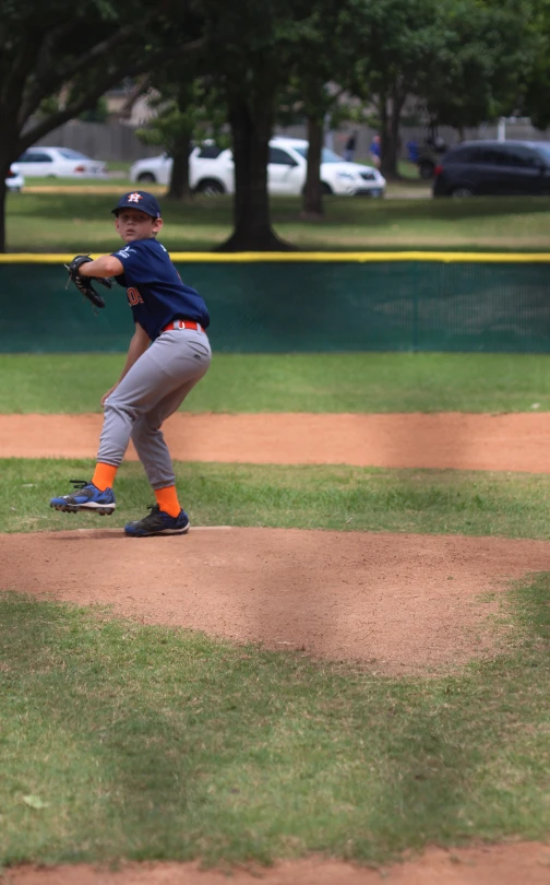 a man is getting ready to pitch a ball