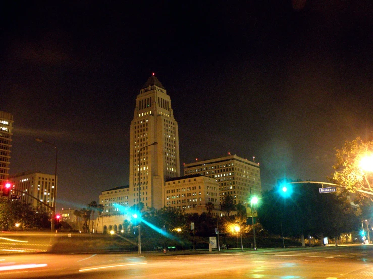 the night time view of a city street