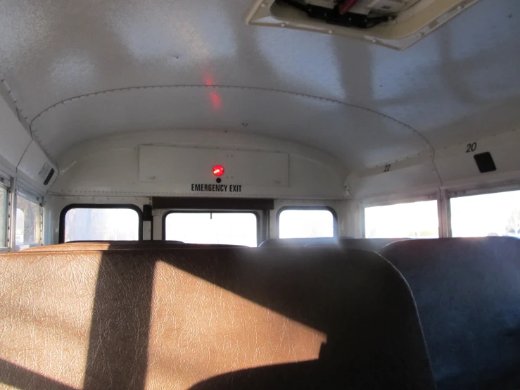 inside the rear of a school bus and view of windows