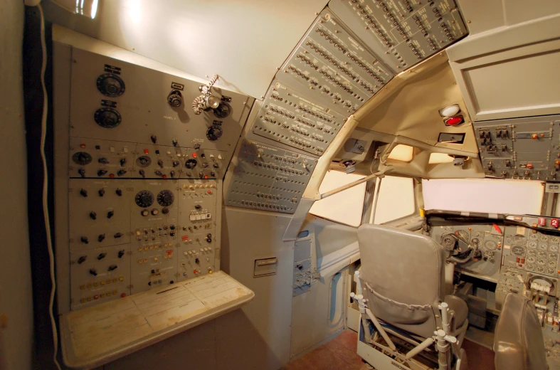 an airplane's cockpit with several controls and control panels