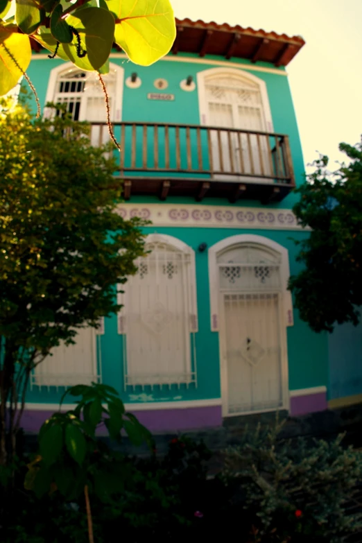 an old building with a wooden balcony and balconies