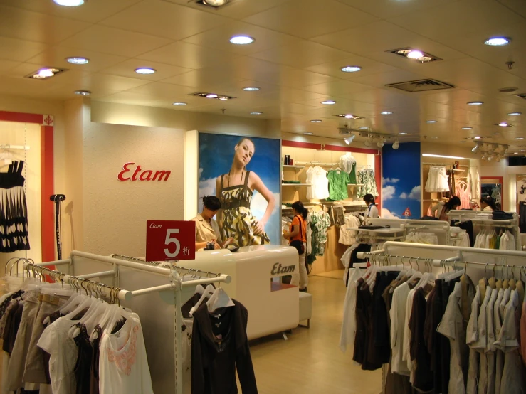 a clothing store with a variety of products hanging on racks