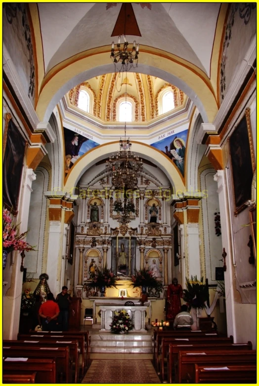 a view of the inside of a church with people