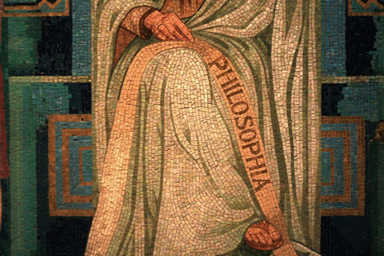mosaic artwork depicting a man holding the cross