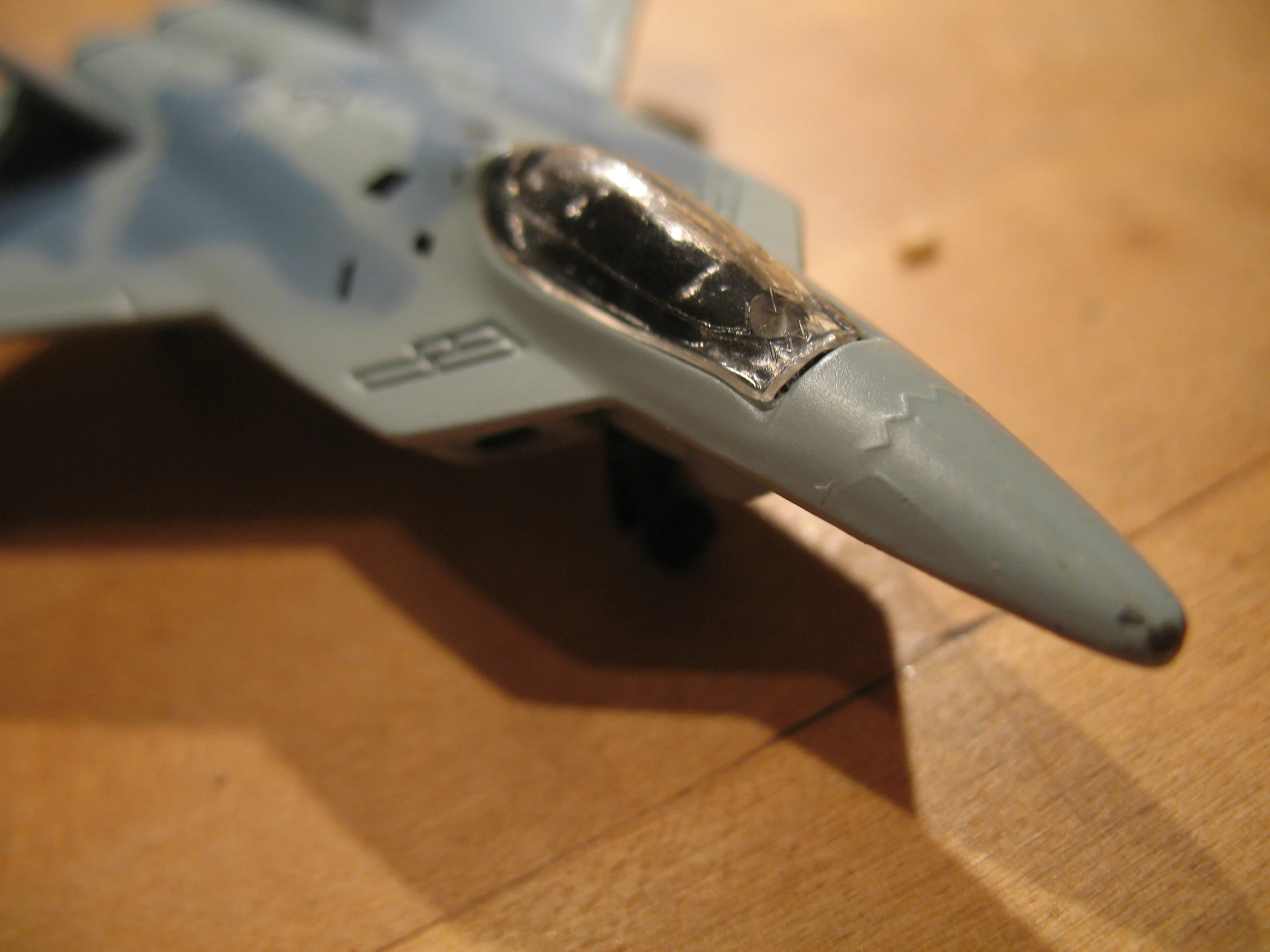 a toy fighter jet is sitting on the table