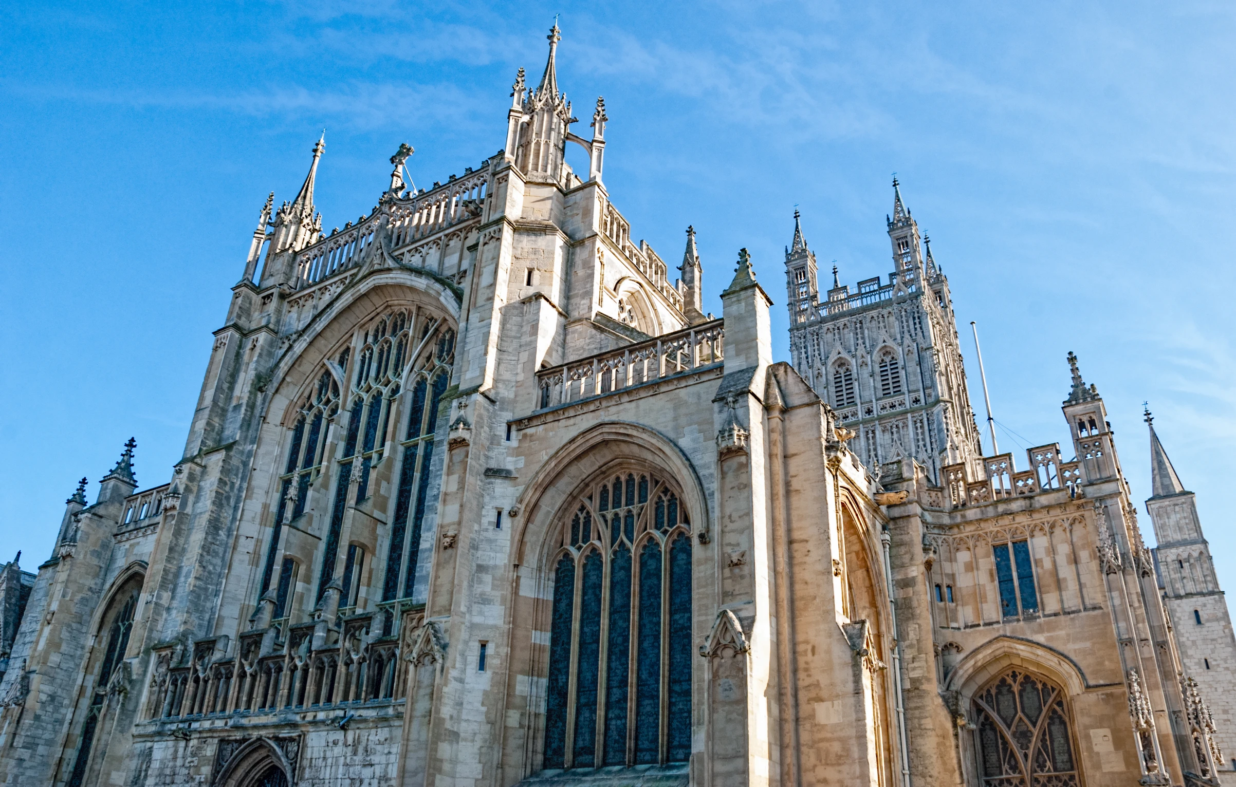 a large church tower towering over a city