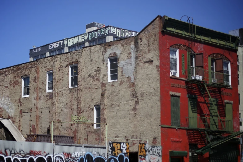 the building has graffiti written on it's side