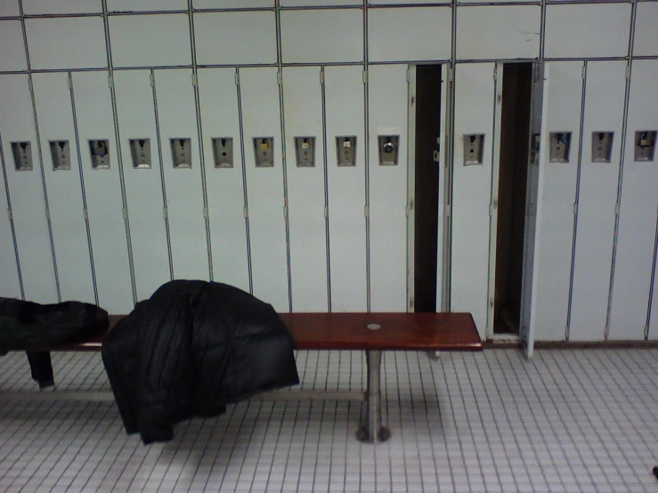 a table sits in front of a room with doors