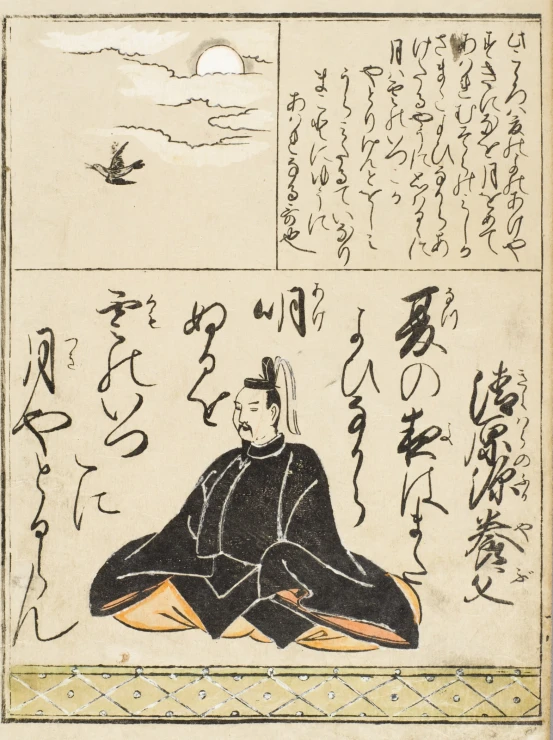 a man sitting on top of a wooden floor