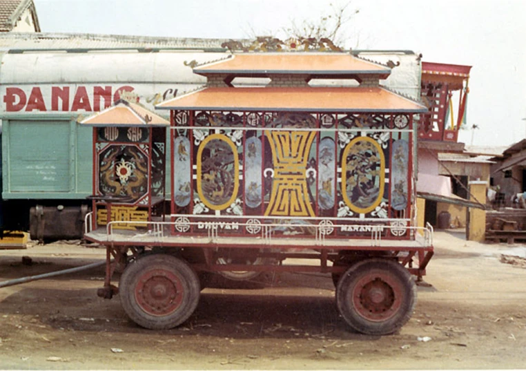 the wagon is parked in front of the train