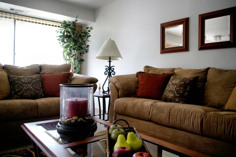 living room with sofa, chairs, and a small table