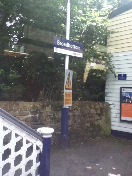 the entrance to brosabotton road showing a sign for direction