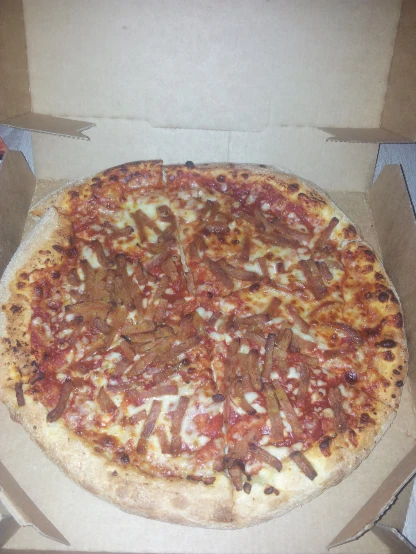 a pizza in a box with two separate slices