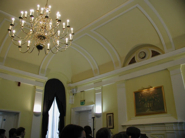 a chandelier hanging from the ceiling of a room