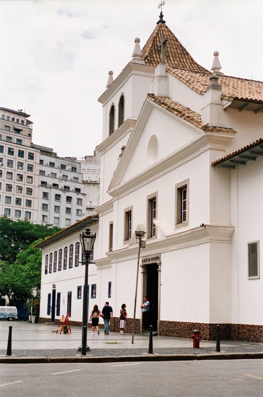 a big white building with a very large tower