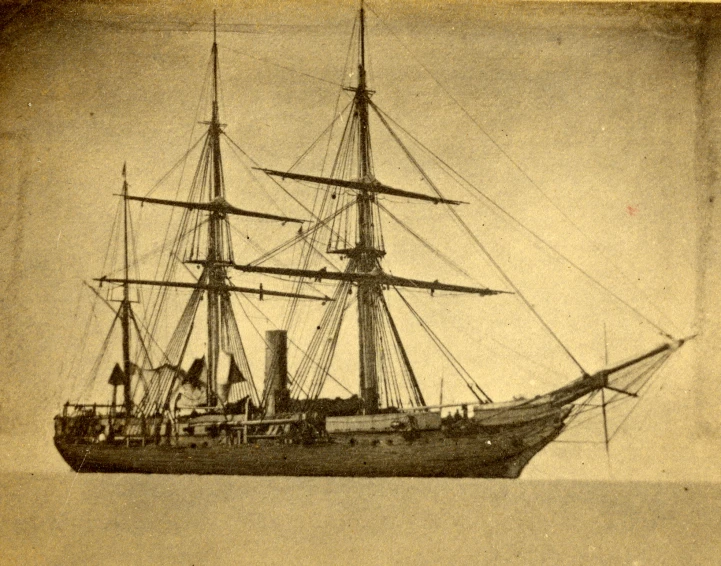 the large ship is parked in a sepia po