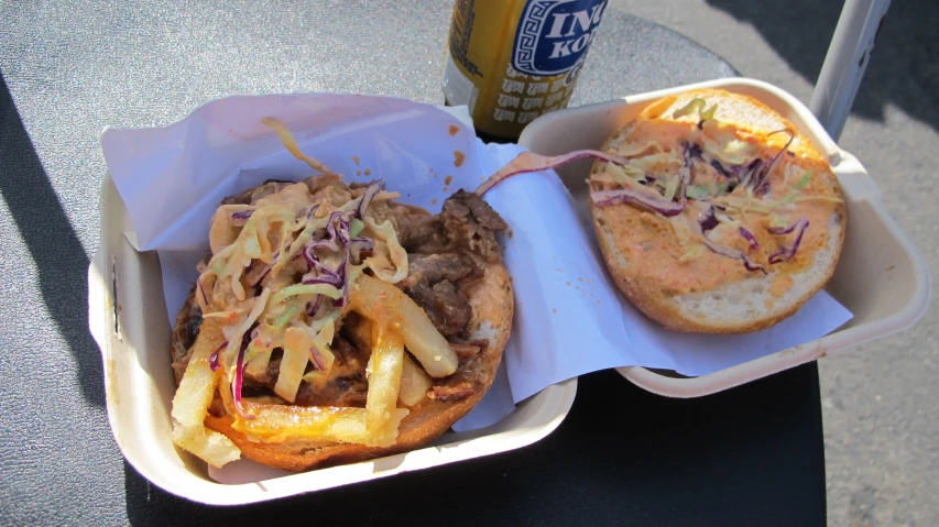 a couple of containers holding some food